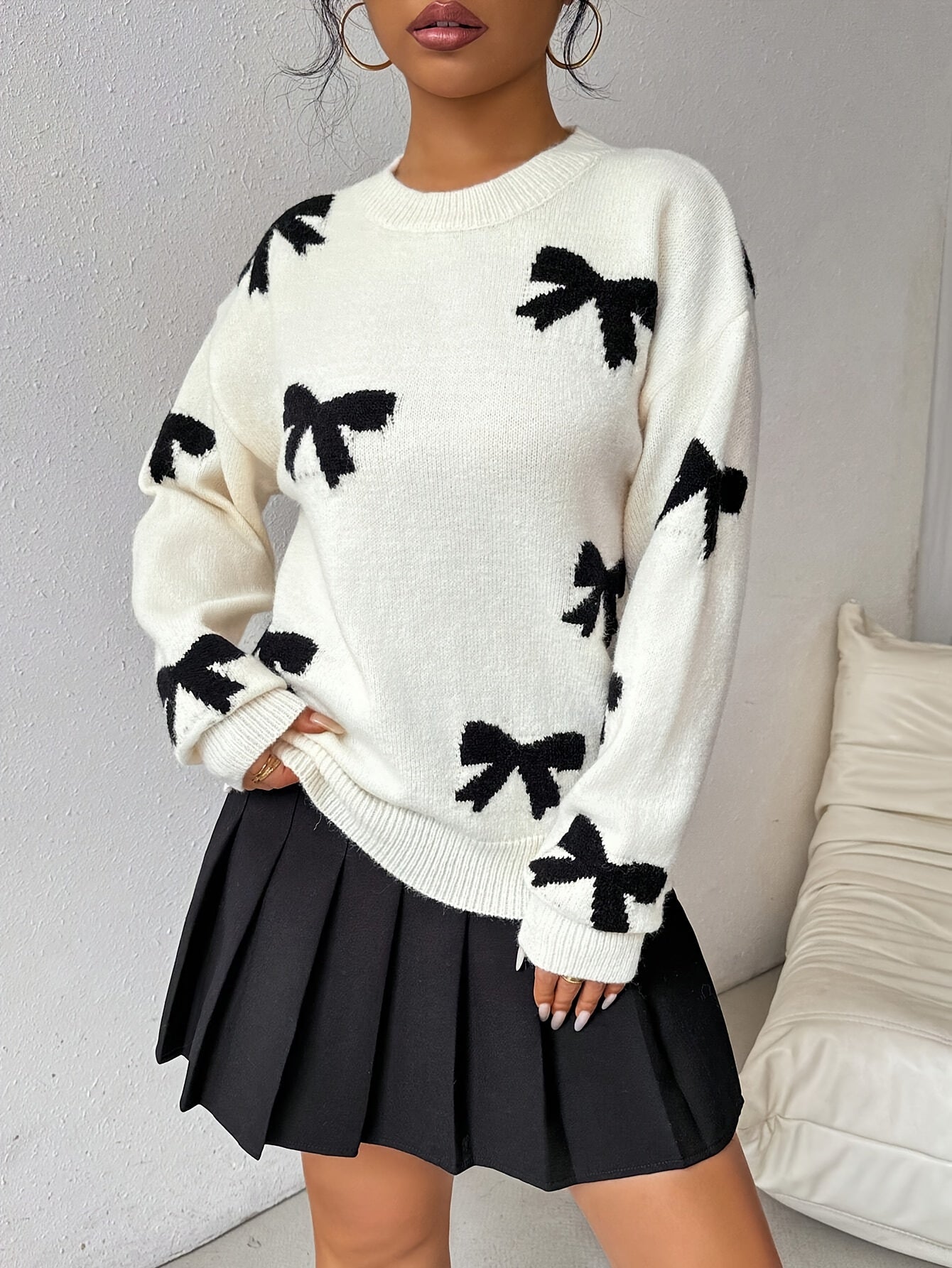 Gebreide sweater met strikjes